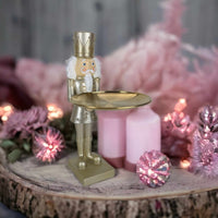 Gold Nutcracker Holding a Gold Plate