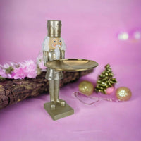 Gold Nutcracker Holding a Gold Plate
