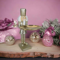 Gold Nutcracker Holding a Gold Plate
