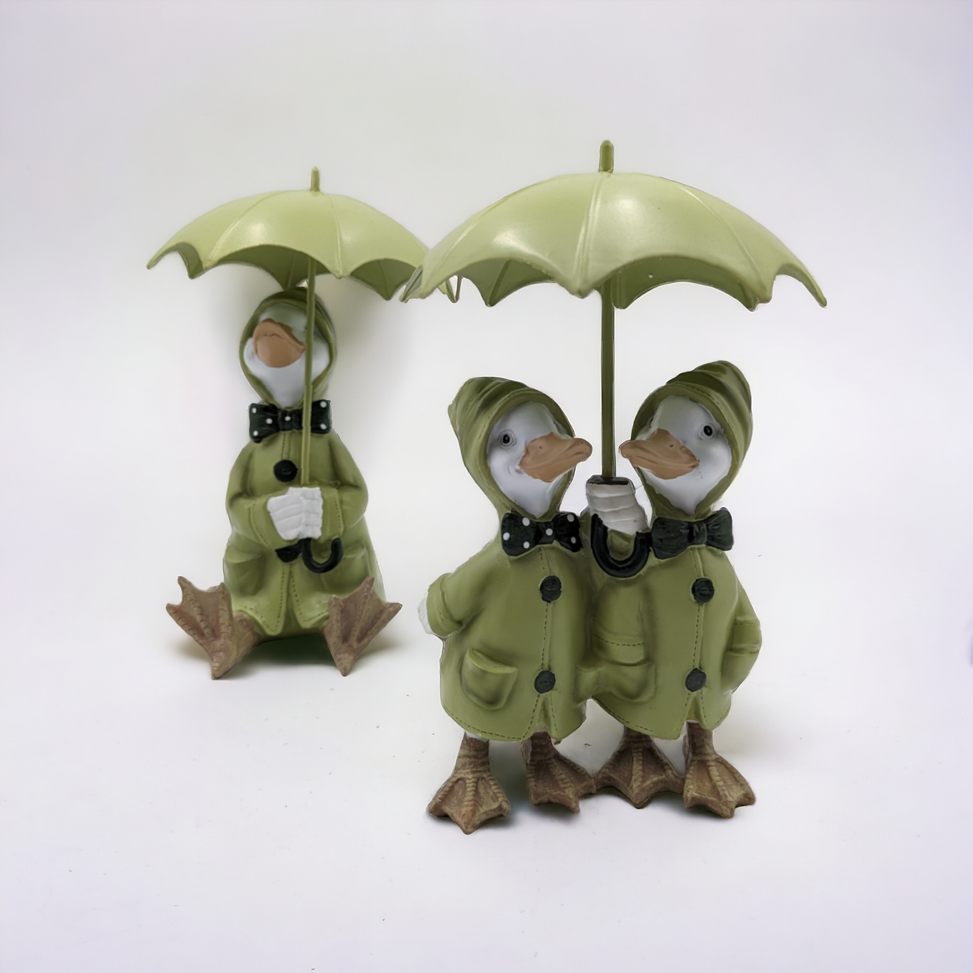 Rainy Duck Sitting with Umbrella