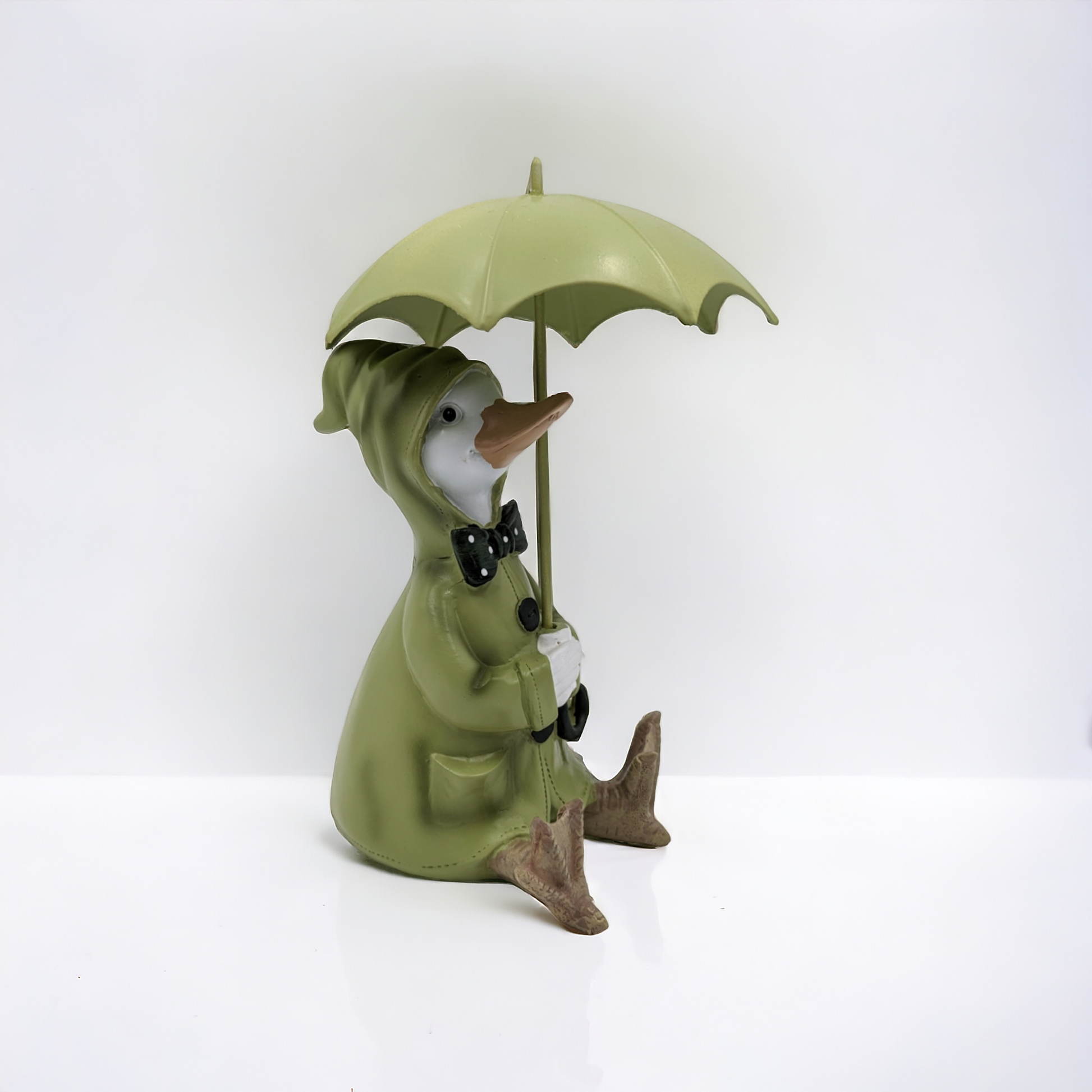 Rainy Duck Sitting with Umbrella