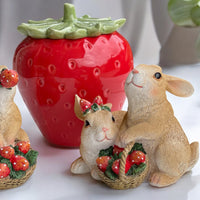 Cuddling Rabbits with Strawberry Basket