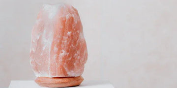 Pink Himalayan salt lamp with warm glow for cozy home decor