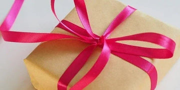 Elegantly wrapped gift with pink ribbon, perfect for home decor gifting