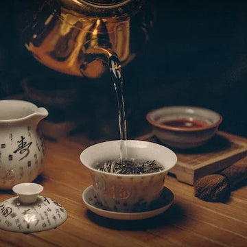 Elegant tea pouring into a ceramic cup, perfect for home decor and cozy tea moments.