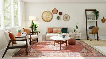 Boho living room with patterned rug, woven wall decor, and cozy sofa for modern home styling