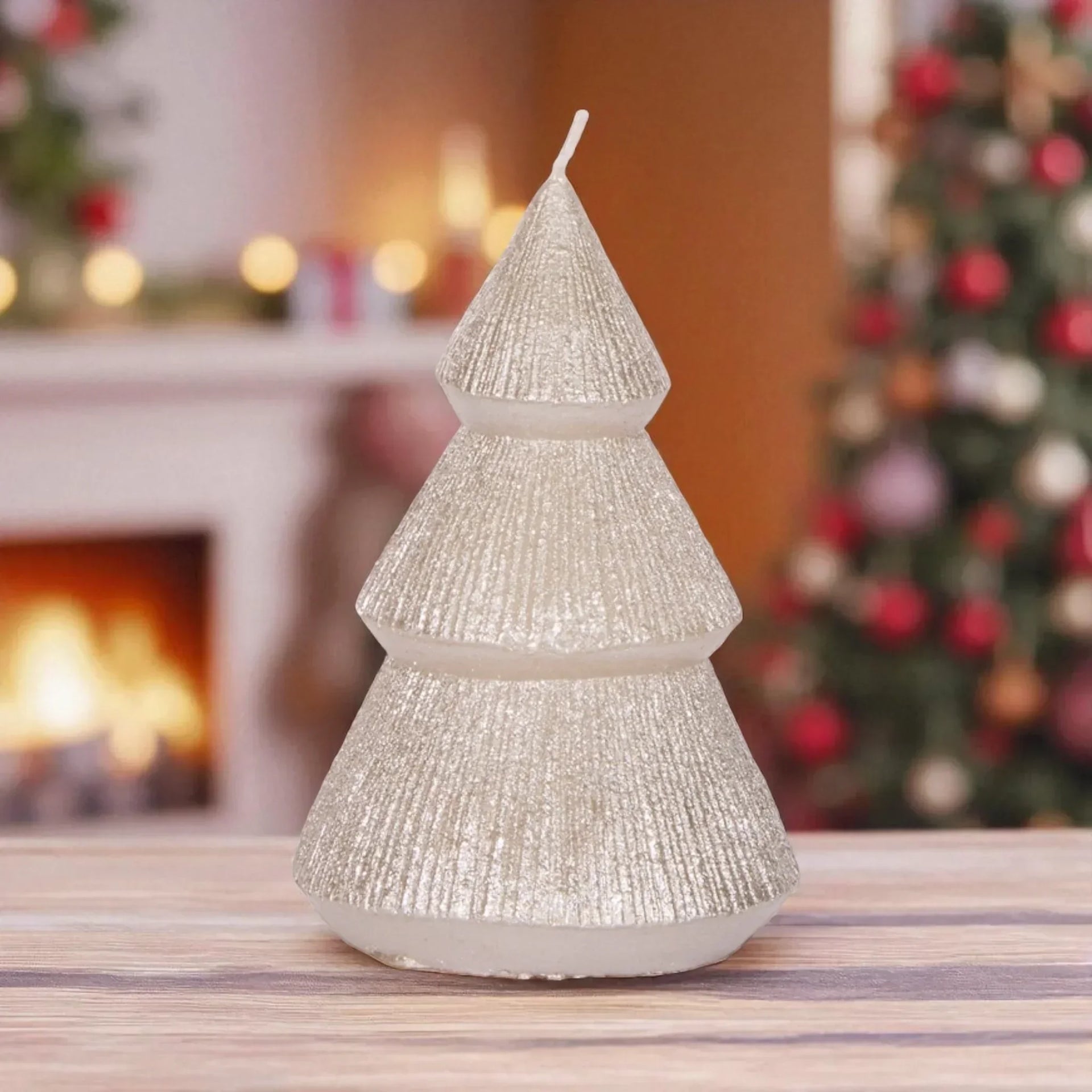 Sparkling silver Christmas tree candle for festive holiday home décor, perfect for Christmas celebrations