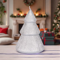 Sparkling silver Christmas tree candle for festive home décor, perfect holiday centerpiece
