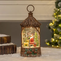 Rustic Christmas lantern with Santa, reindeer, and snow globe effect, perfect for holiday home decor