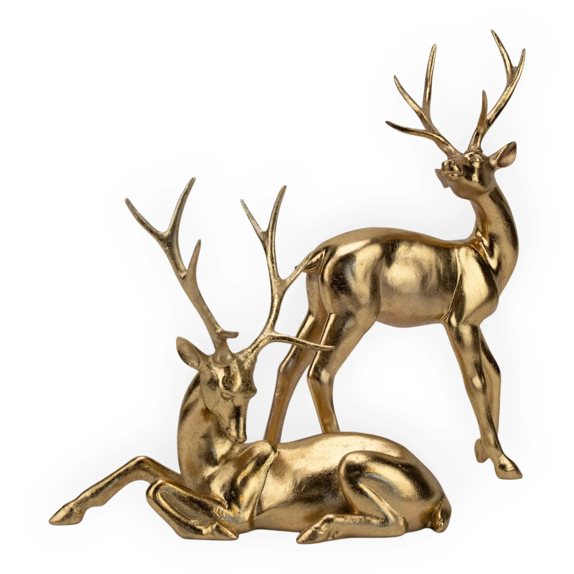 Golden deer statues, standing and lying, elegant home décor accents for living room or shelf display