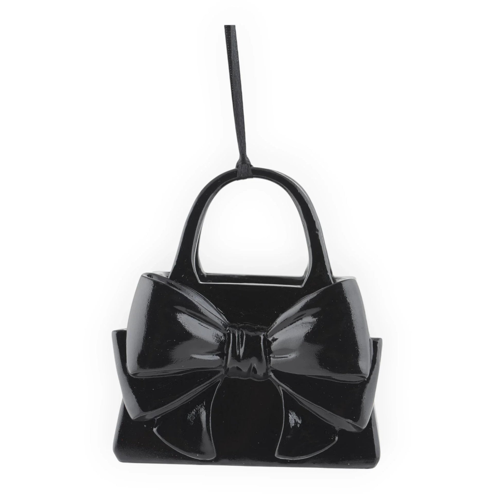 Glossy black handbag ornament with large bow, perfect for home décor or festive hanging display.