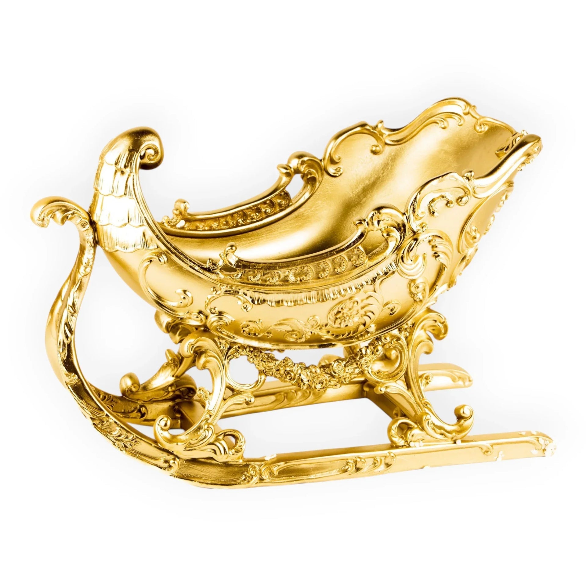 Luxury gold sleigh ornament with ornate baroque detailing, perfect for festive home décor and holiday displays.