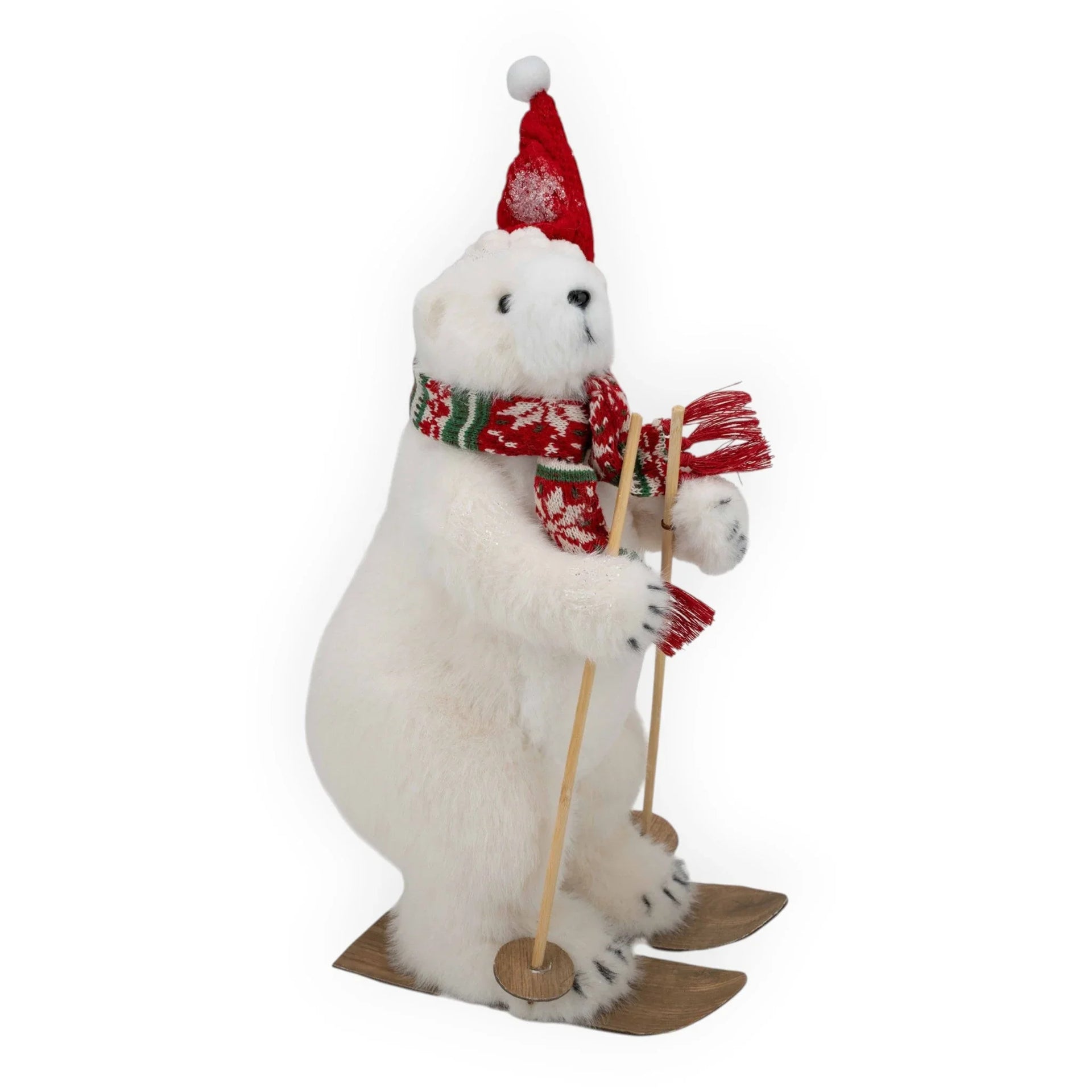Festive polar bear figurine skiing with red hat and scarf, holiday home décor accent