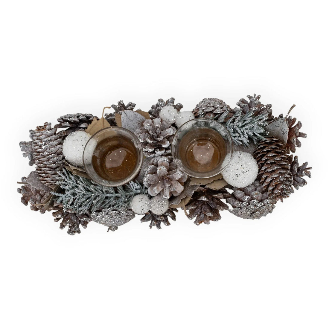 Frosted pinecone centerpiece with glittery ornaments and glass candle holders for holiday home décor