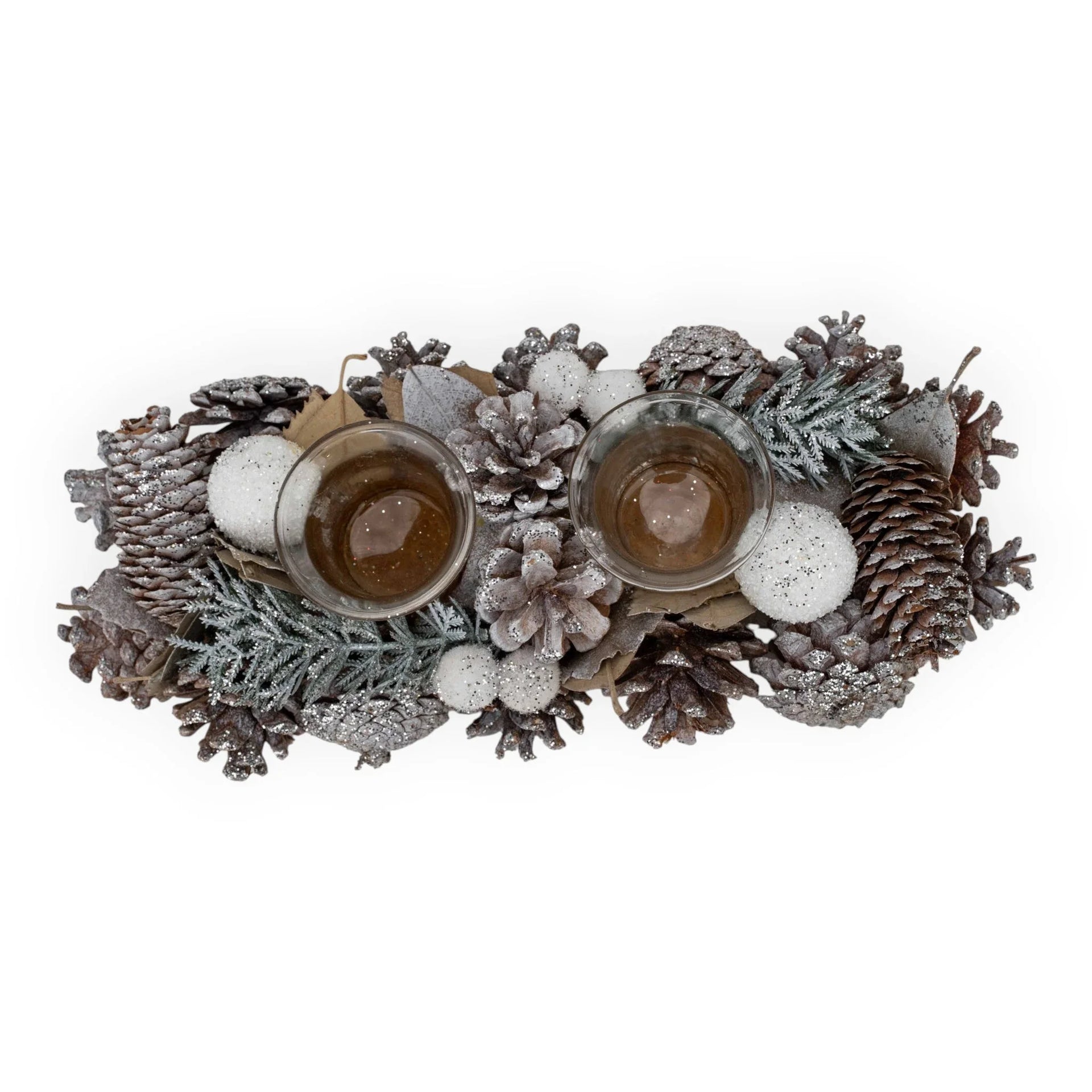 Frosted pinecone centerpiece with glittery ornaments and glass candle holders for holiday home décor