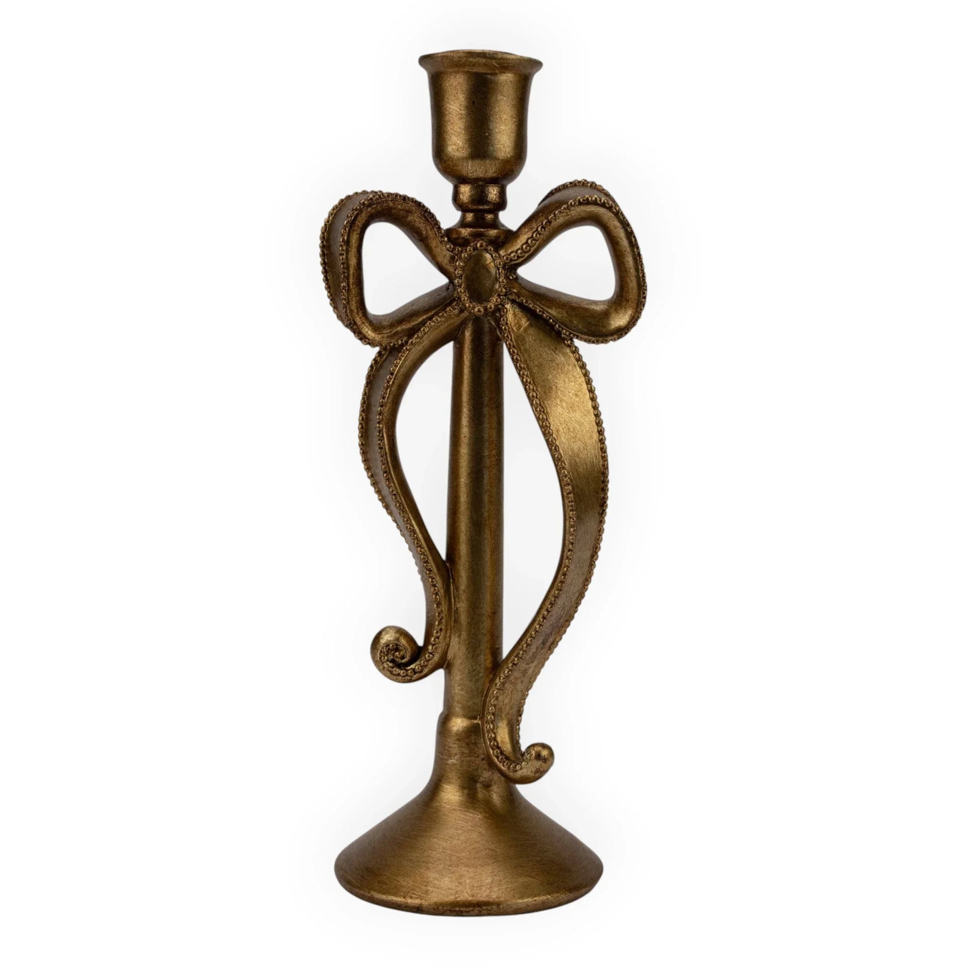 Antique gold candlestick holder with ornate bow design, elegant home décor accent piece