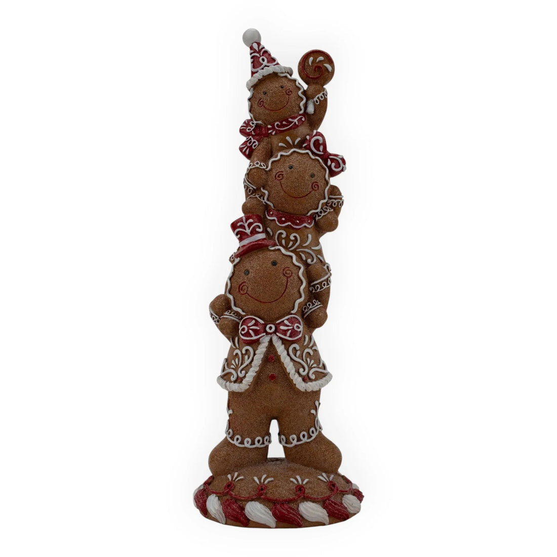 Stacked gingerbread men figurine with red and white icing, holiday home decor