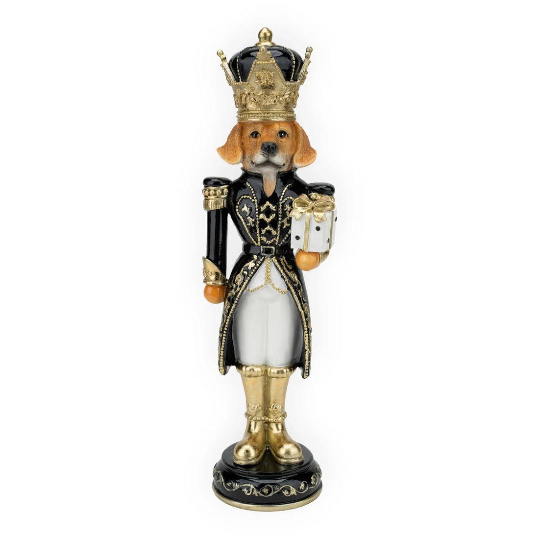 Dog nutcracker figurine in black and gold royal uniform holding gift, holiday home décor