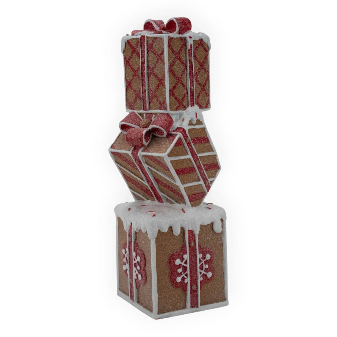 Gingerbread-style Christmas gift boxes with red bows and icing details, festive holiday décor