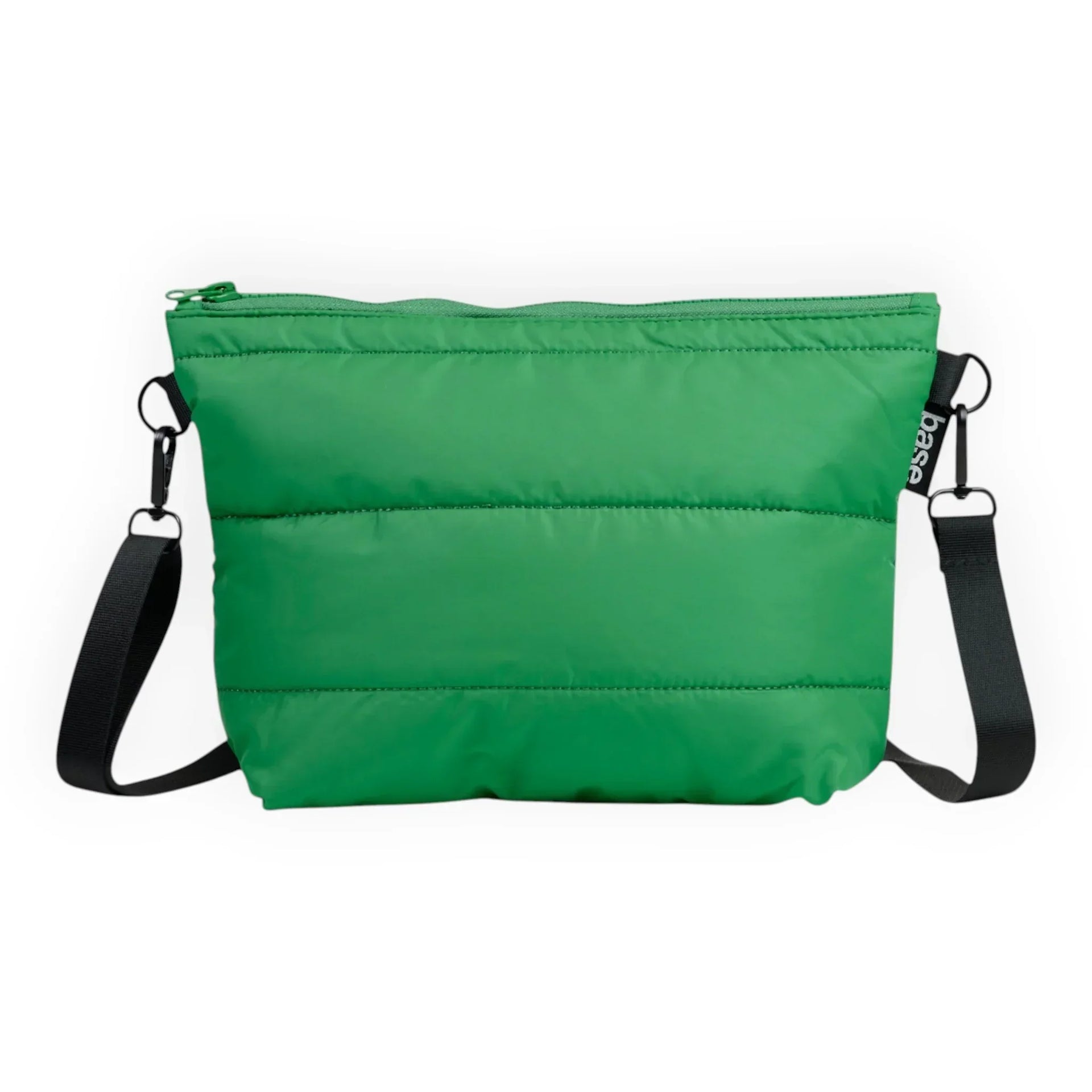 Vibrant green crossbody bag with black strap, ideal for everyday carry and travel accessories.