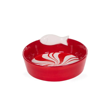 Red ceramic bowl with white fish accent and swirl pattern, decorative home accessory