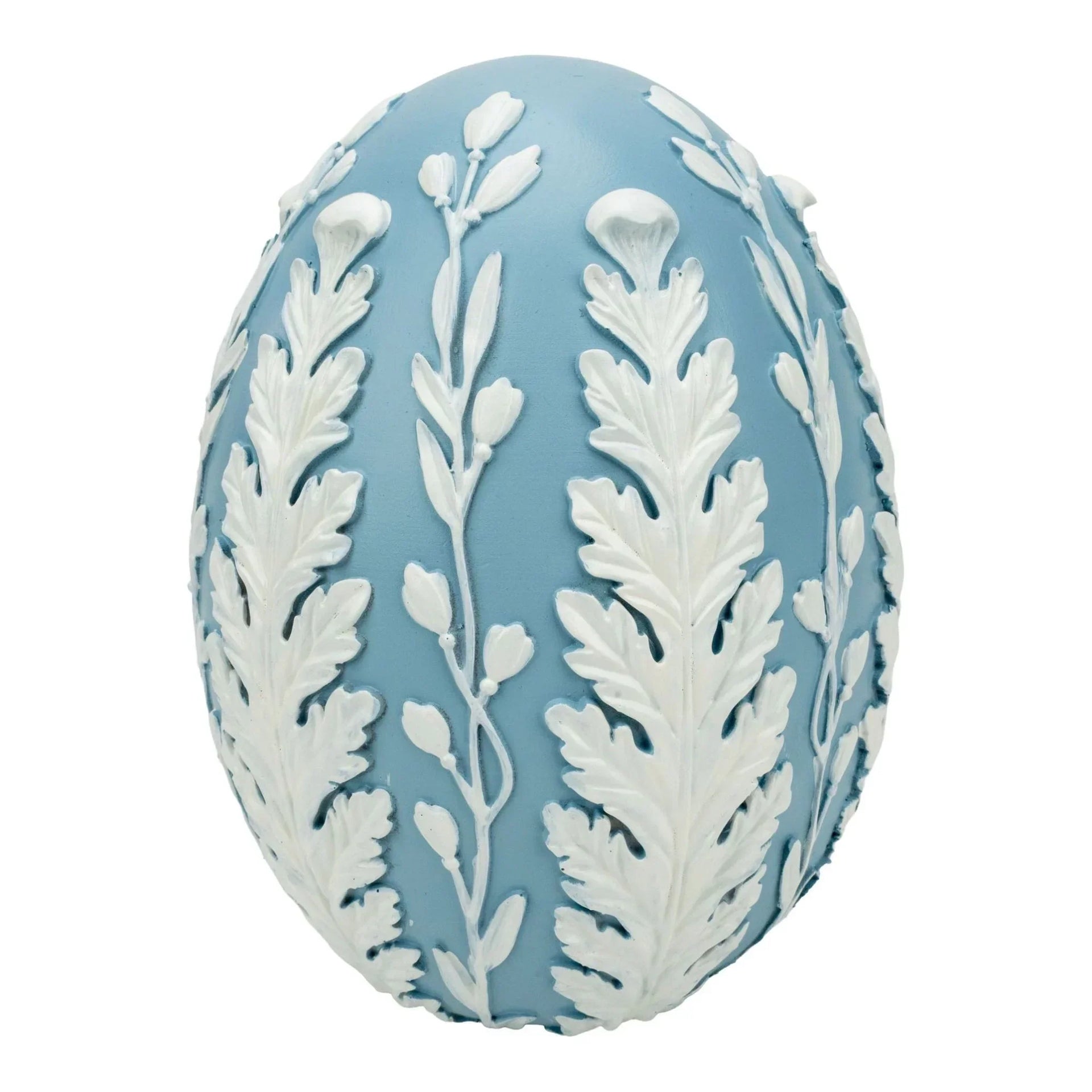 Blue and white decorative egg with raised leaf and floral patterns, elegant home décor accent