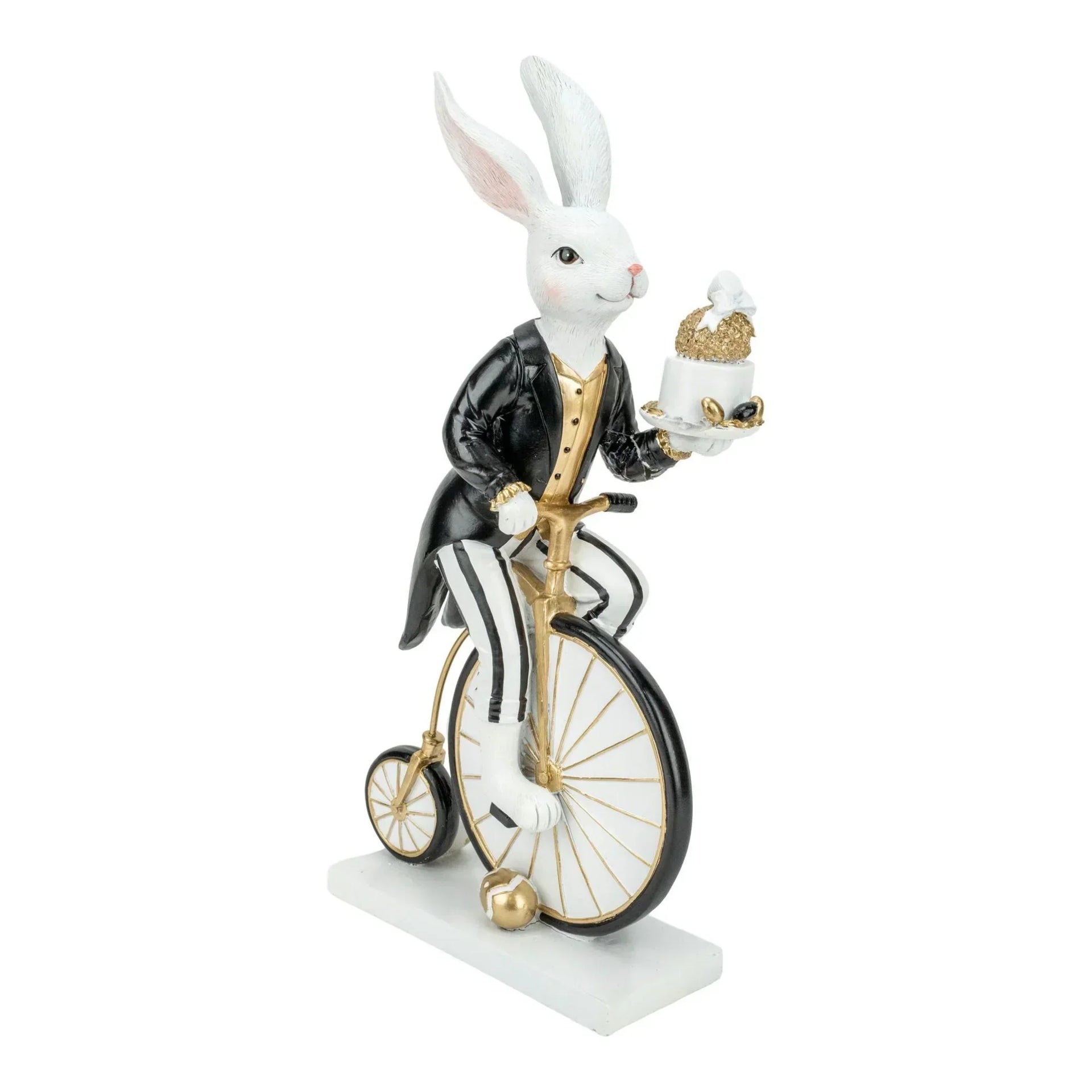Elegant white rabbit figurine in tuxedo riding vintage penny-farthing bicycle, holding cake, home décor accent