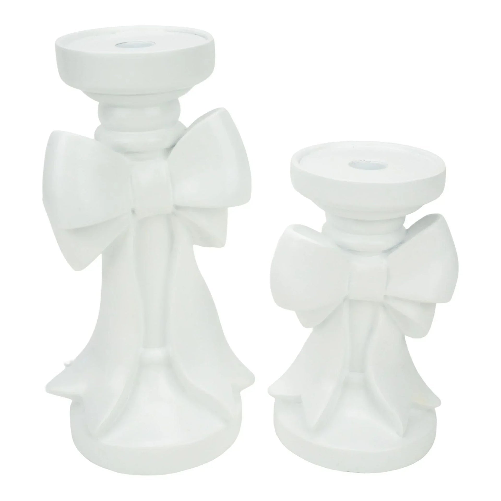 White ceramic angel candle holders with bow details, elegant home décor accents