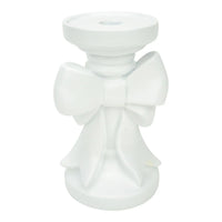 White ceramic candle holder with bow design, elegant home décor accent piece