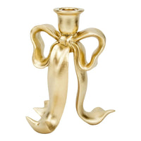 Gold bow-shaped candle holder for elegant home décor and vintage-inspired table settings
