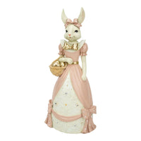 Elegant bunny figurine in pink dress holding Easter egg basket, vintage home décor accent