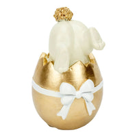 White bunny figurine in gold egg with bow, elegant home décor accent piece