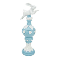 White rabbit figurine on blue floral pedestal, elegant home décor accent piece