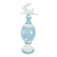 Blue and white decorative Easter egg with bunny figurine, floral accents, home décor accent piece