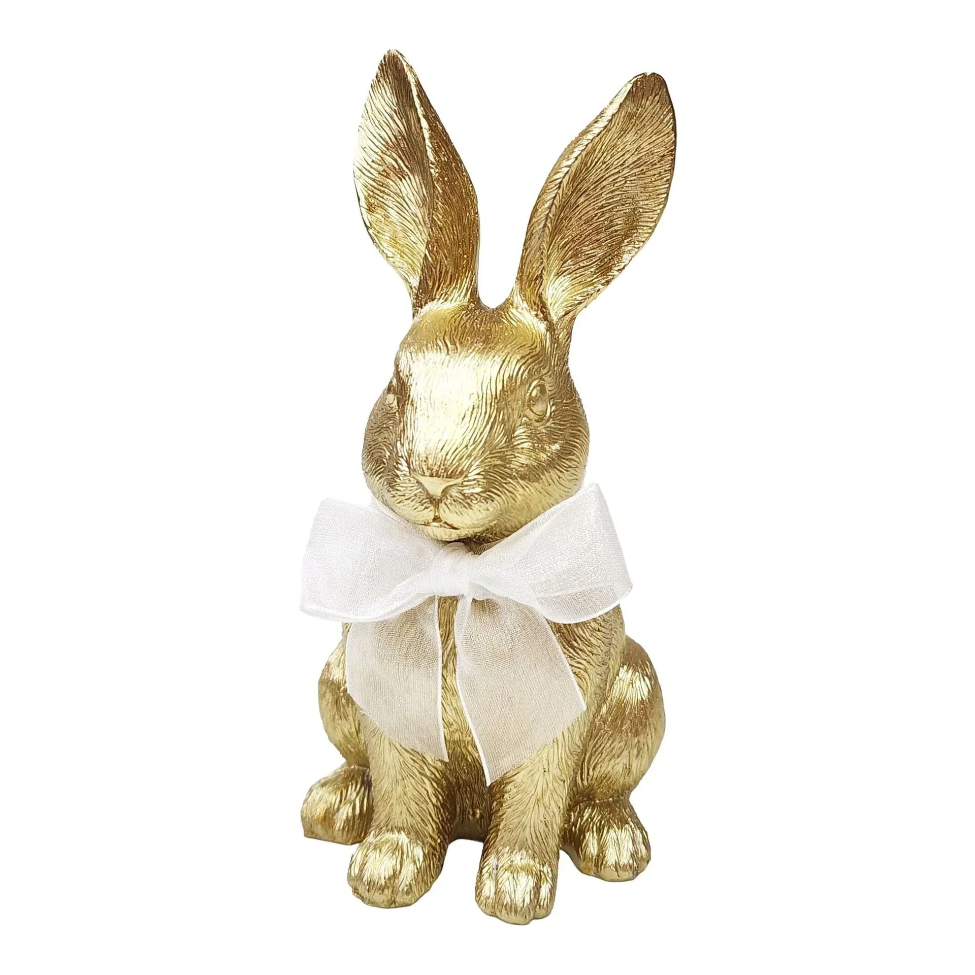 Gold rabbit figurine with white bow, elegant home décor accent for shelves or tables