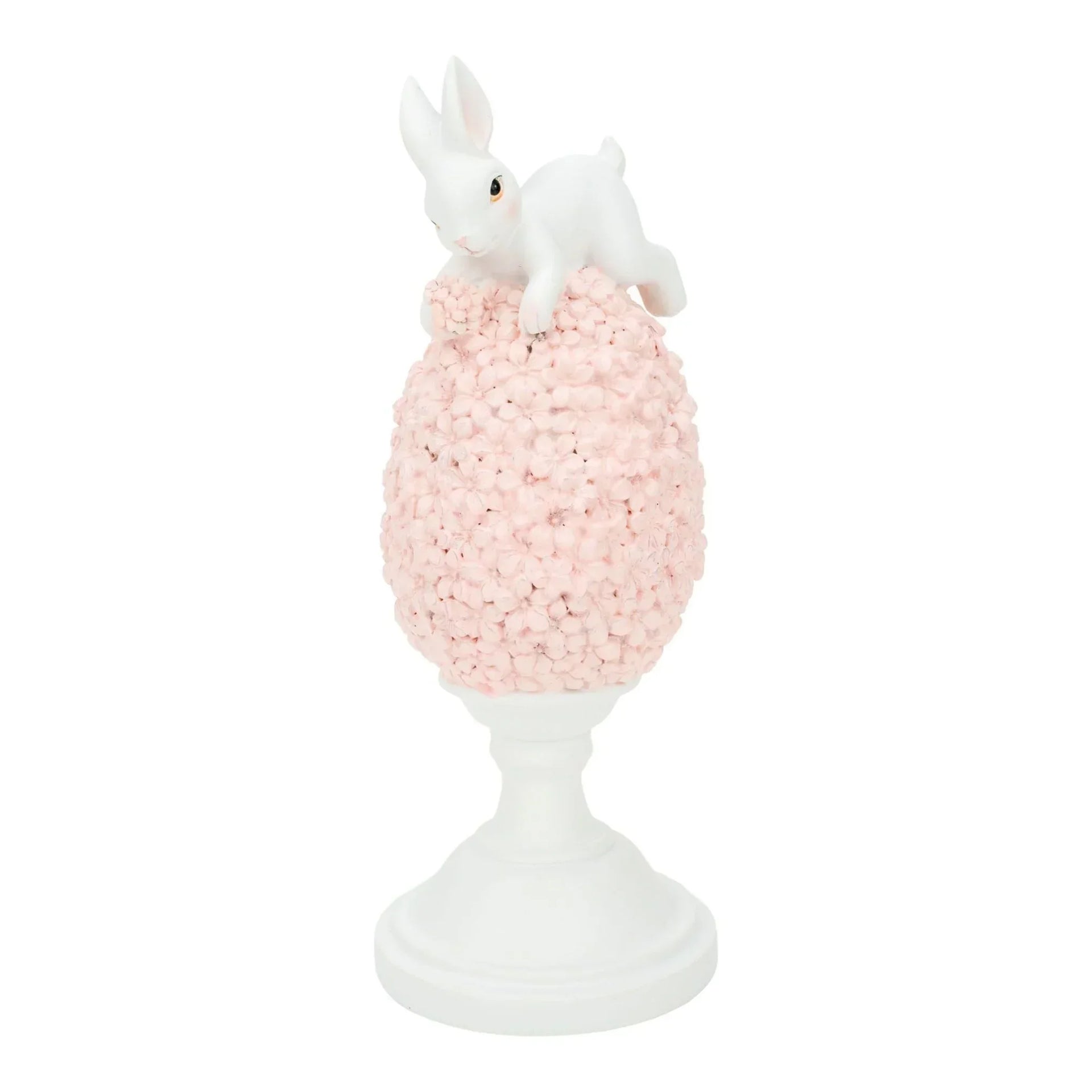 White bunny figurine perched atop pink floral egg on pedestal, elegant home décor accent piece