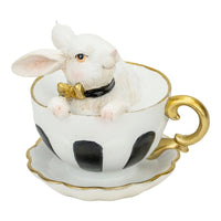 White bunny figurine in gold-trimmed teacup with black spots, vintage home décor accent piece