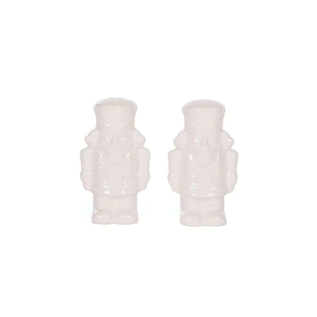 White ceramic nutcracker figurines, elegant holiday home decor for festive styling