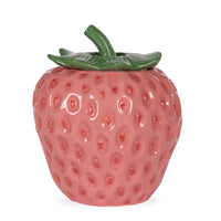 Glossy ceramic strawberry-shaped decorative jar with green leaf lid, perfect for home décor and kitchen accessories.