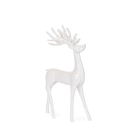 White ceramic deer figurine with elegant antlers, perfect for modern home décor and festive styling.