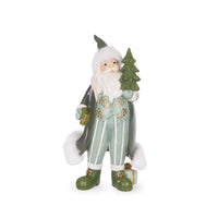 Green and white Santa figurine holding Christmas tree and gifts, festive holiday home decor