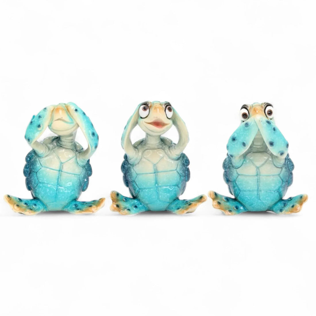 Three blue ceramic turtle figurines in see-no-hear-no-speak-no-evil poses, home décor accent pieces