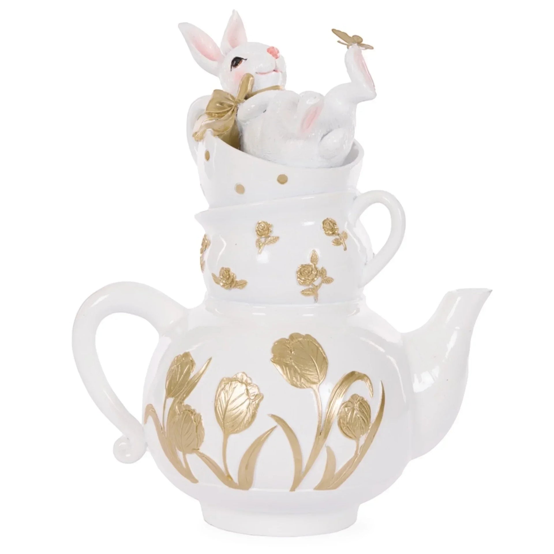 White ceramic teapot with gold tulips, stacked cups, and a bunny figurine for home décor