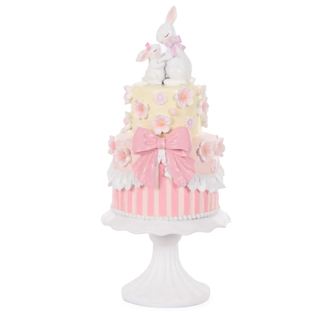 Pink and white tiered cake decor with bunnies, flowers, and bow for home décor