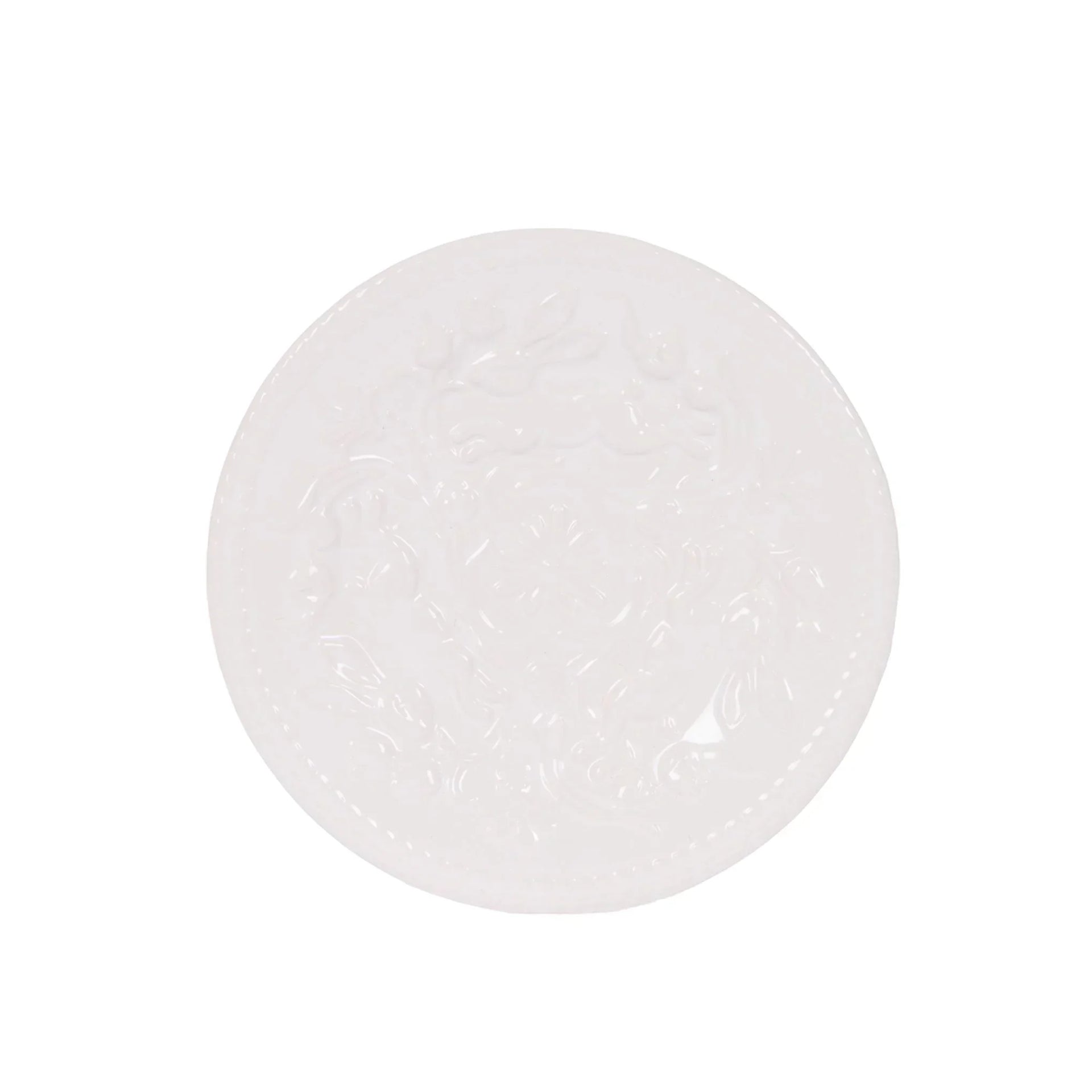 White ceramic plate with embossed floral design, elegant home decor accent piece