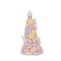 Pastel macaron tower with bunnies, perfect for Easter home décor and sweet-themed displays