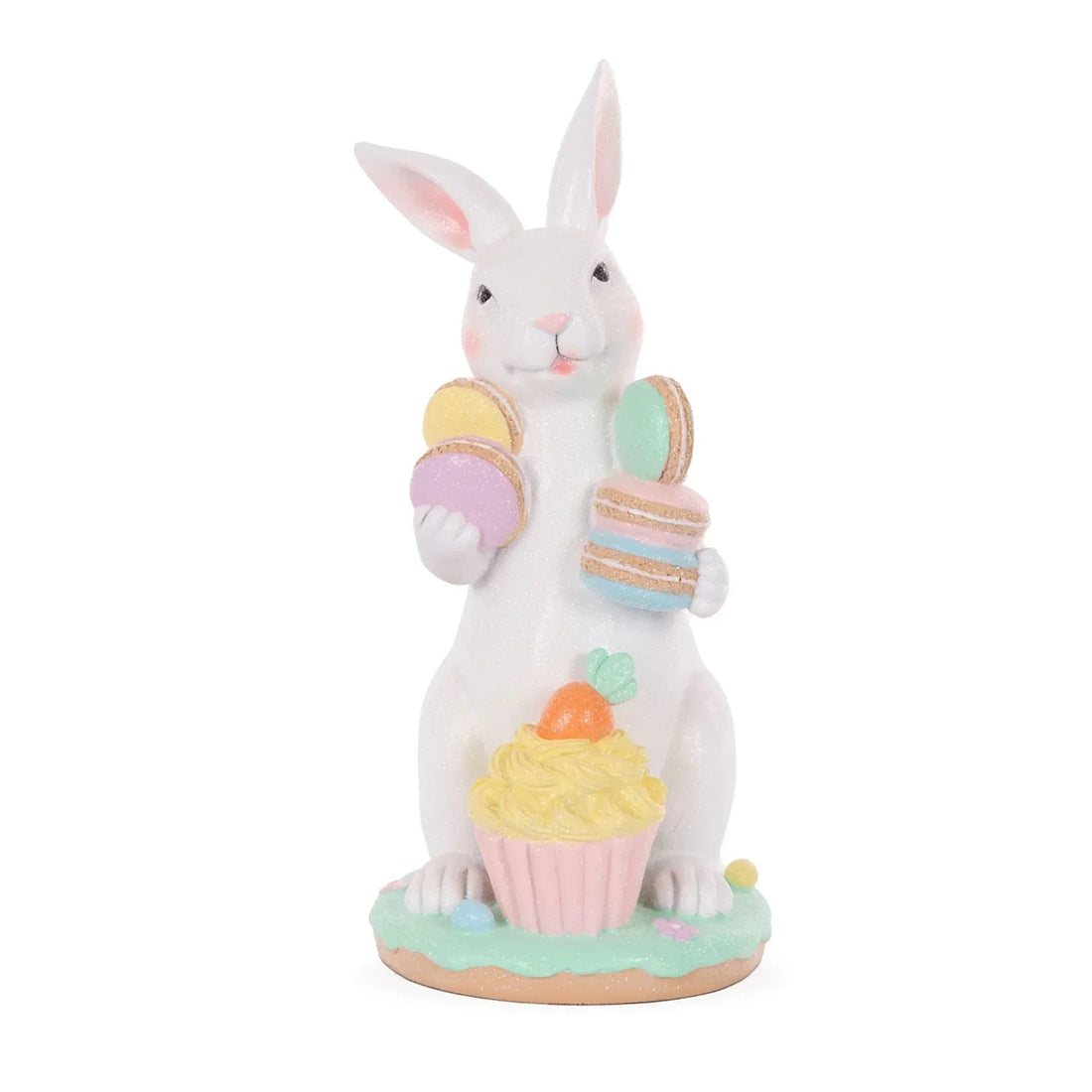 White glitter bunny figurine holding pastel macarons and a cupcake with carrot topper, Easter home decor