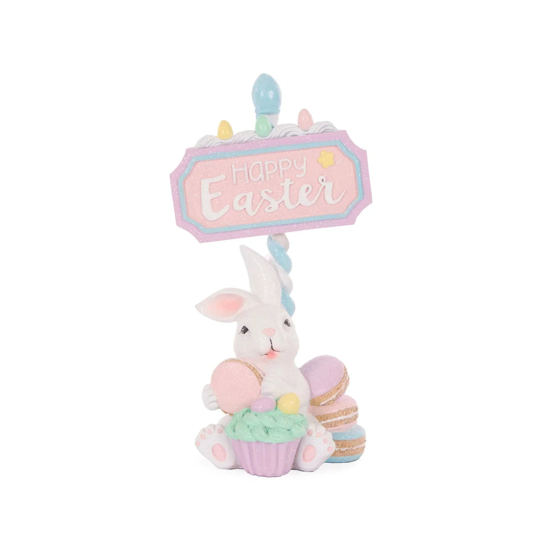 Glittery Easter bunny figurine holding macarons & cupcake, with 'Happy Easter' sign, pastel home décor