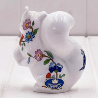Aynsley porcelain pig figurine with hand-painted floral design, vintage home decor accent