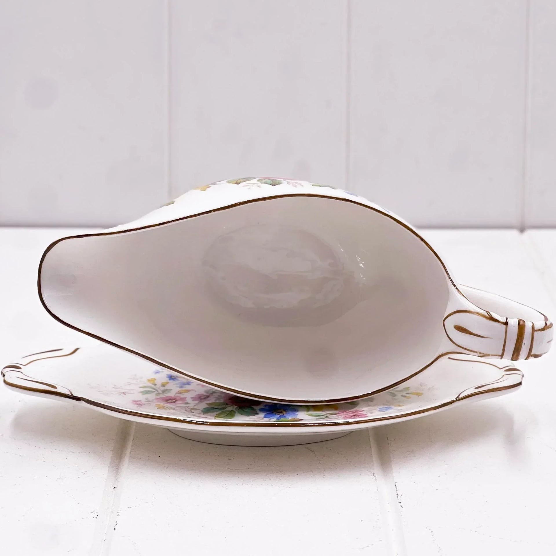 Elegant floral gravy boat with gold trim, vintage porcelain serving dish for home dining decor